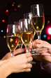 Happy Christmas. People hands with crystal glasses/