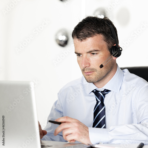 Photo: headset and laptop headset and laptop