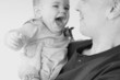 laughing baby and dad