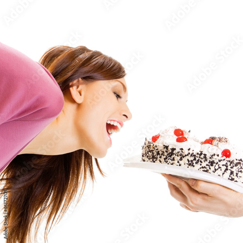 Photo: Cheerful woman eating pie, over white Cheerful woman eating pie, over white