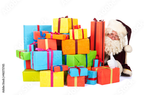 Photo: Santa Claus with many presents Santa Claus with many presents