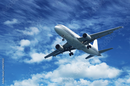 Photo: Passenger air plane on blue sky Passenger air plane on blue sky