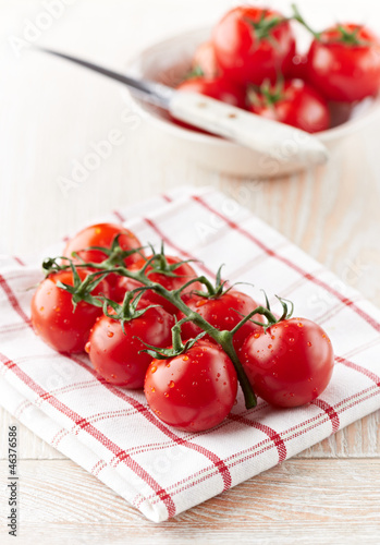 Photo: Cherry tomatoes on the vine Cherry tomatoes on the vine