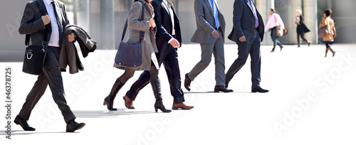 Photo: Employees going against the office. Panorama. Employees going against the office. Panorama.