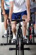 Low Section Of People On Exercise Bikes