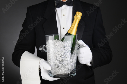 Photo: Sommelier with Champagne Ice Bucket Sommelier with Champagne Ice Bucket