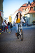 Urban biking - teenage girl and bike in city