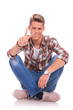 Seated Man Victory Sign