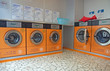 automatic washing machines in a laundromat