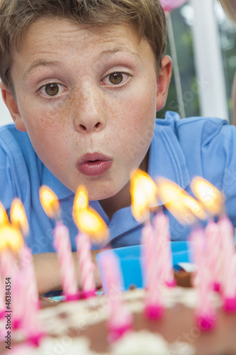 Photo: Boy Child Blowing Out Birthday Cake Candles Boy Child Blowing Out Birthday Cake Candles