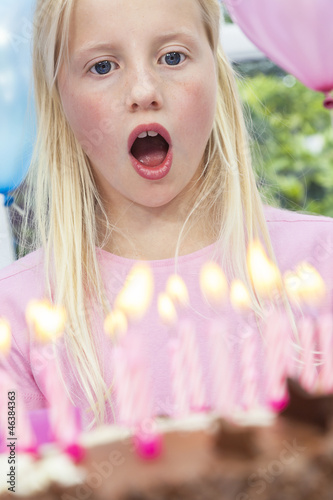 Photo: Girl Child Blowing Out Birthday Cake Candles Girl Child Blowing Out Birthday Cake Candles