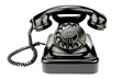 Old rotary phone on white background.
