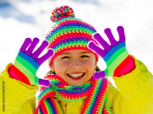 Photo: Winter fun - lovely girl has a fun in snow Winter fun - lovely girl has a fun in snow