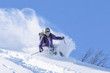 Freeriderin in Schneewolke