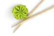 Photo: Wooden chopsticks and wasabi isolated Wooden chopsticks and wasabi isolated
