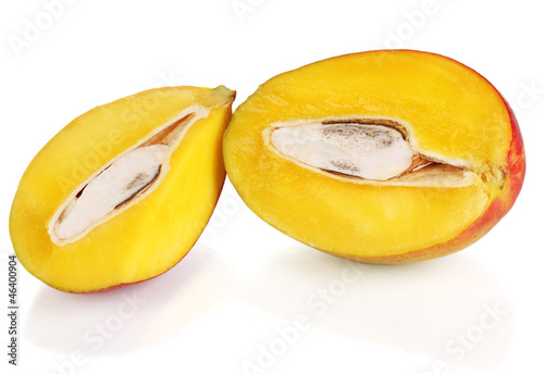 Photo: Ripe appetizing mango isolated on white Ripe appetizing mango isolated on white