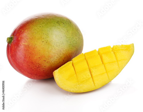 Photo: Ripe appetizing mango isolated on white Ripe appetizing mango isolated on white