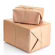 parcels boxes with kraft paper, isolated on white