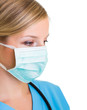 Woman in medical doctor uniform holding clipboard
