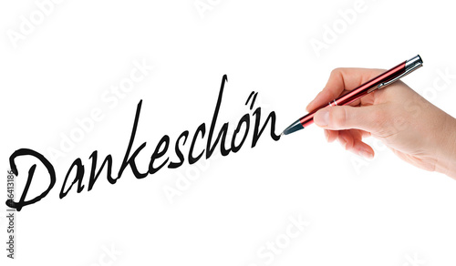 Photo: Hand mit Stift schreibt Dankeschön Hand mit Stift schreibt Dankeschön