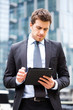 Businessman using a tablet