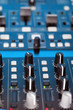 Control knobs on the console of a DJ deck