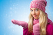 woman catching snowflakes
