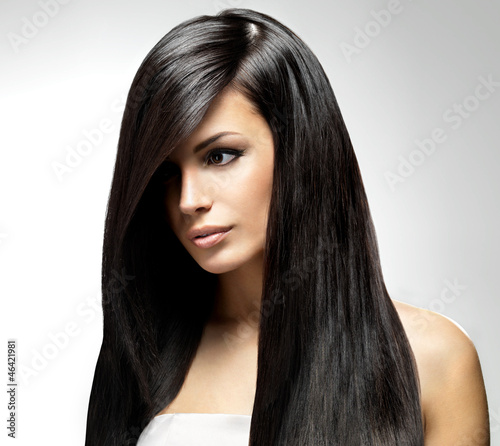 Photo: Beautiful woman with long straight hair Beautiful woman with long straight hair