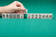 Smooth table surface with a mahjong on it