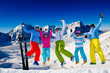 Ski, snow, sun and winter fun - happy family ski team