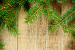 christmas fir tree on rustic wooden board