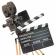 Movie composition. Vintage camera and clapperboard.