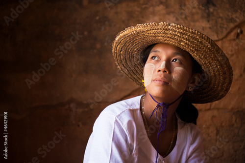 Photo: Myanmar girl in straw hot looking away Myanmar girl in straw hot looking away