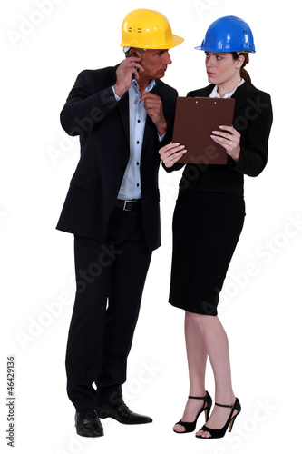 Photo: Woman glaring at her colleague Woman glaring at her colleague