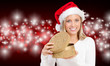 Photo: junge frau öffnet ein weihnachtsgeschenk junge frau öffnet ein weihnachtsgeschenk