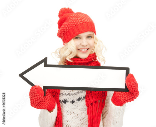 Photo: woman with direction arrow sign woman with direction arrow sign