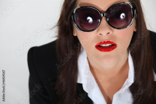 Photo: Woman with sunglasses Woman with sunglasses