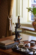Old microscope on the desk of the doctor