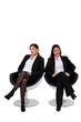 Businesswomen sitting side by side