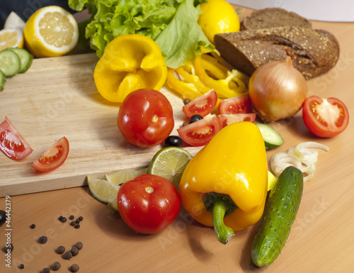 Photo: peppers surrounded by vegetables peppers surrounded by vegetables
