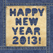Happy New Year 2013! - made of denim letters on a leather label