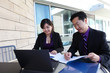 Chinese Man and Woman on Computer