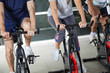 Low Section Of People On Exercise Bikes