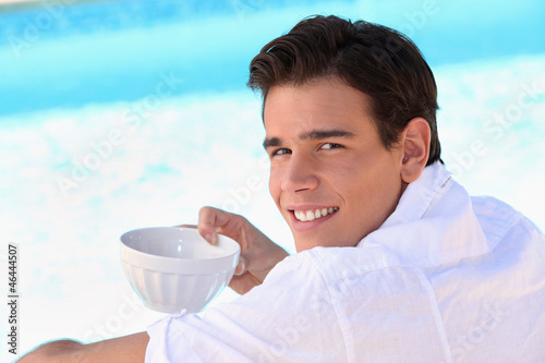 Photo: Young boy with bowl Young boy with bowl