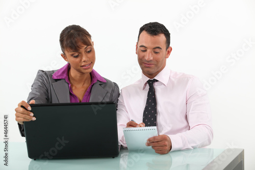 Photo: Businesspeople working together Businesspeople working together