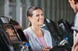 Photo: Instructor Looking At Male Client Exercising On Treadmill Instructor Looking At Male Client Exercising On Treadmill
