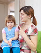 Mother berates her baby