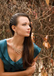 Beautiful woman in Autumn garden
