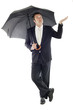 businessman protected by an umbrella