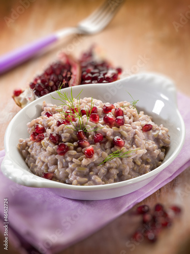 Photo: risotto with pomegranate, selective focus risotto with pomegranate, selective focus